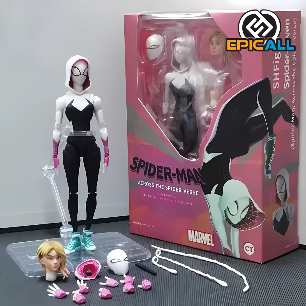 Una figura de acción articulada de Spider-Gwen, un personaje del universo Spider-Man. La figura es de tamaño mediano y está vestida con un traje de araña blanco y negro con detalles en rosa. Incluye múltiples accesorios, como cabezas intercambiables y telarañas.
