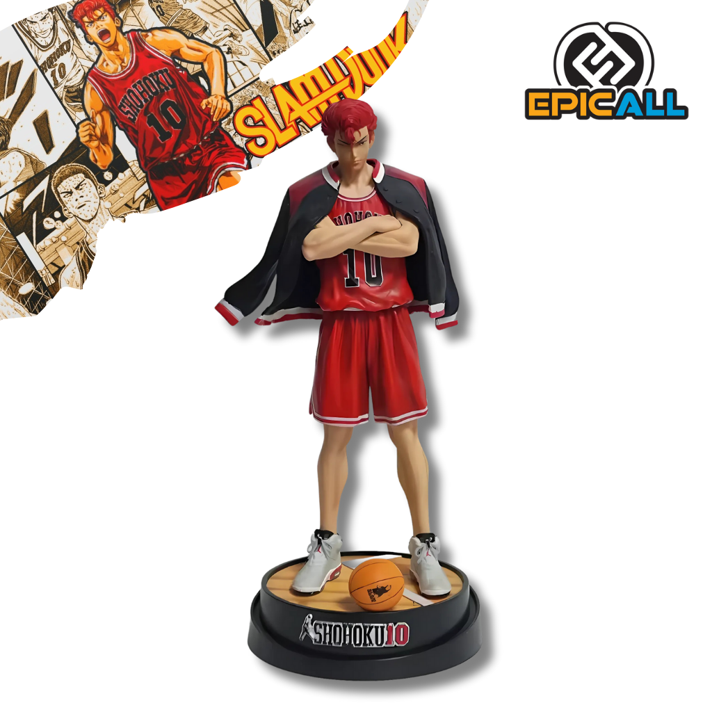 Una figura de acción de Hanamichi Sakuragi, el protagonista del anime Slam Dunk. La figura representa a Sakuragi en una pose desafiante, con el brazo levantado como si estuviera a punto de lanzar una pelota de baloncesto. Tiene el cabello rojo característico y viste el uniforme de su equipo, Shohoku. La figura está colocada sobre una base con el logo de Shohoku.