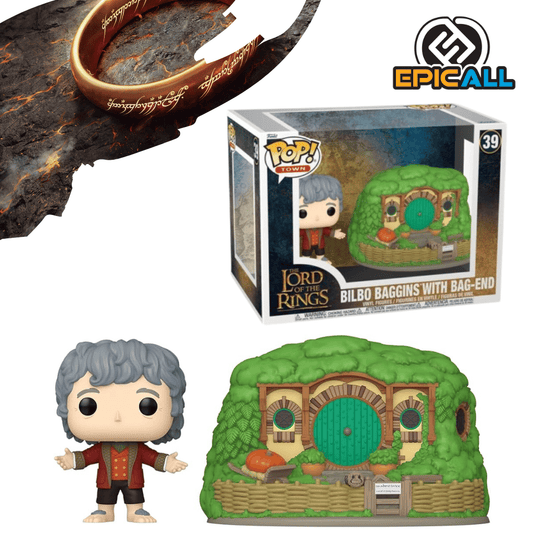 Un Funko POP! Moment que muestra a Bilbo Baggins sentado en un banco frente a la puerta redonda y verde de Bolsón Cerrado. Bilbo, un hobbit, tiene pies grandes y peludos, viste un chaleco rojo y pantalones marrones, y sostiene un libro. La puerta verde tiene una perilla redonda y una ventana redonda. La escena se complementa con un pequeño jardín y una valla de madera.