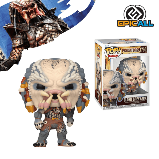 Un Funko POP del Elder Greyback de Predator 2. La figura tiene una cabeza grande con una máscara gris clara y rasgos faciales expuestos, incluyendo una boca con grandes colmillos. Lleva un collar con calaveras y armadura detallada de color gris y oro. La figura tiene los ojos grandes y redondos, característicos de los Funko POP. La caja del Funko POP se ve detrás de la figura.
