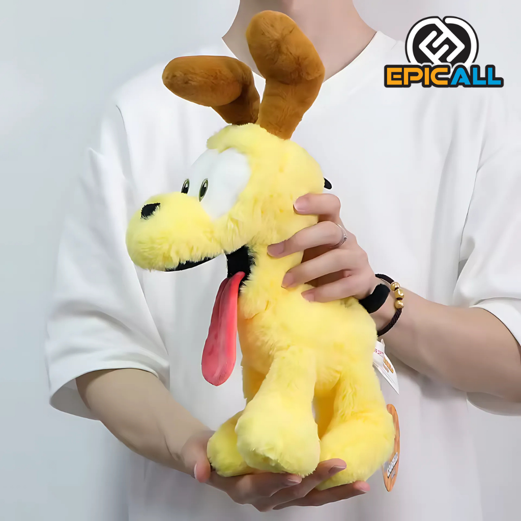 Foto real del peluche con una persona sujetándolo