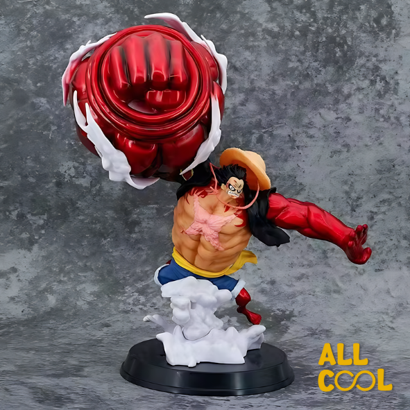 Estatua de un personaje de anime, Luffy, en una pose de lucha. Tiene un brazo gigante y musculoso de color rojo. La estatua está sobre una base circular y mide 30 centímetros de alto.