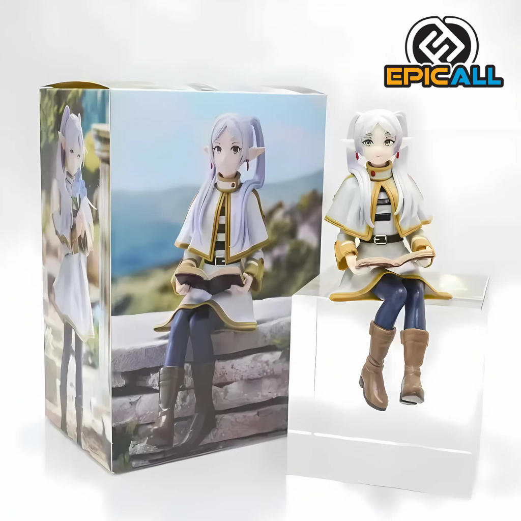 Foto de la figura topper de frieren y su caja