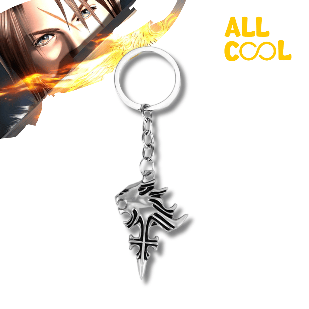 Un llavero de acero con el símbolo de León (Griever) del videojuego Final Fantasy VIII. El símbolo es de color plateado con detalles en negro y tiene un diseño detallado. El llavero está colgado de una anilla.