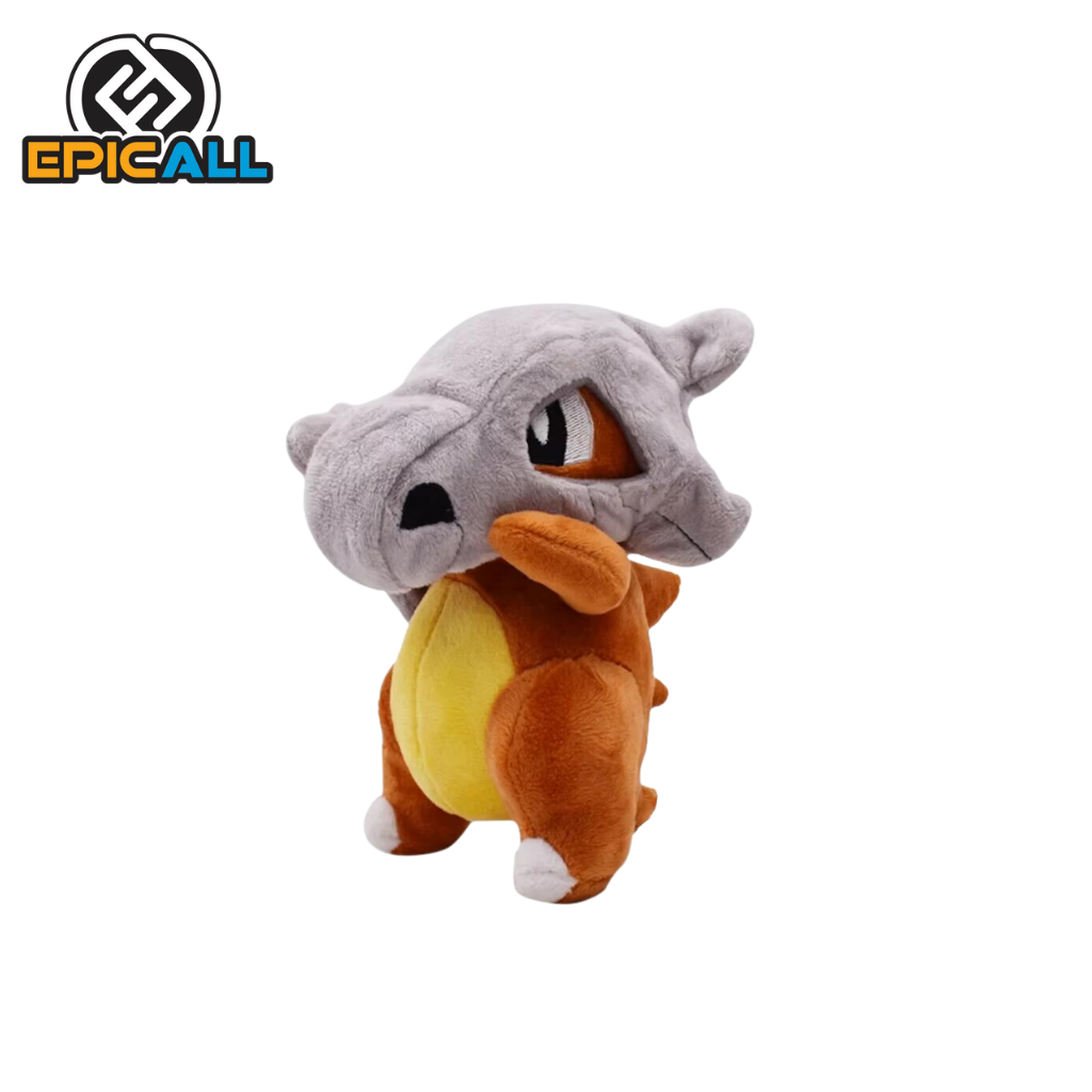Peluche de Cubone de 16 cm de altura y 11 cm de ancho, con un cuerpo marrón, barriga amarilla y un casco gris de hueso.