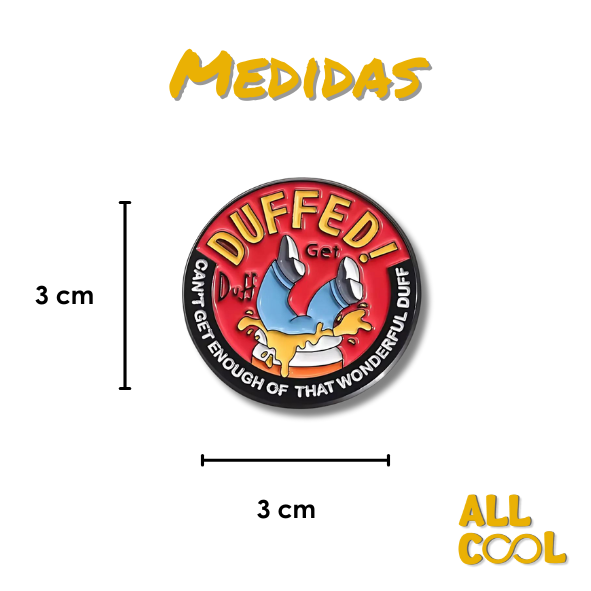 Pin redondo con una ilustración de Los Simpsons que dice ‘Duffed!’ y una imagen de homero denro de una lata de cerveza sobre un fondo rojo