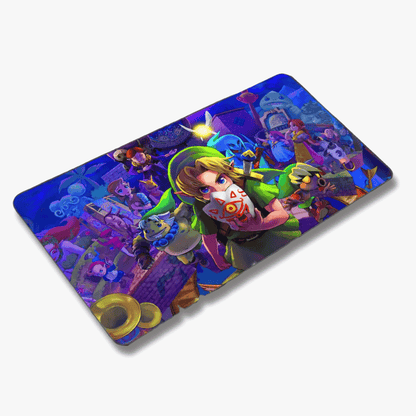 Mouse pad gamer rectangular de 30x60 cm con diseño de The Legend of Zelda: Majora's Mask en tonos azules y morados, mostrando a Link sosteniendo una máscara con el símbolo de la Trifuerza rodeado por varios personajes del juego.
