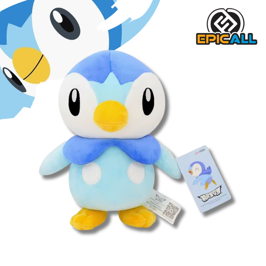 Un peluche de Piplup de 25cm de altura. Piplup es un Pokémon de color azul claro con detalles en blanco, azul oscuro y amarillo. Tiene ojos grandes y negros y un pico amarillo. El peluche está de pie y mirando hacia adelante.