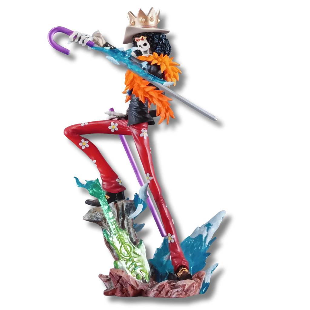 Una figura de estatua de Brook, el personaje esqueleto de One Piece, de unos 33 cm. La figura viste un traje de rayas rojas con flores blancas, una chaqueta negra y una bufanda grande de plumas naranjas. Sostiene una espada plateada y un bastón morado, y está de pie sobre una base marrón con detalles de hielo azul y una guitarra verde.