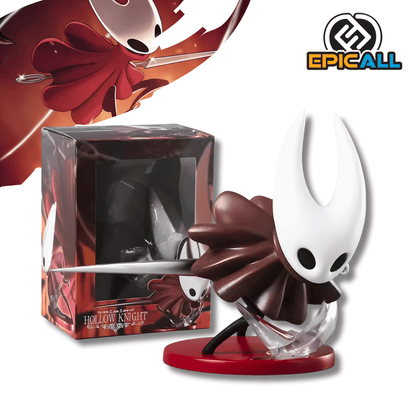 Una figura de estatua de Hornet del videojuego Hollow Knight, de unos 11.5 cm. El personaje tiene una máscara blanca con cuernos, un cuerpo pequeño de color marrón oscuro (o rojo), y sostiene una aguja delgada. La figura está montada sobre una pequeña base roja con un efecto de ataque translúcido que simula movimiento.