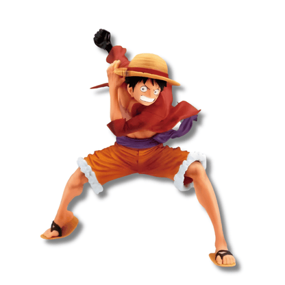 Estatua de Monkey D. Luffy de One Piece en una pose de ataque dinámica, con ambos brazos extendidos hacia adelante, vistiendo su camisa roja desabrochada y pantalones cortos de jean azules.