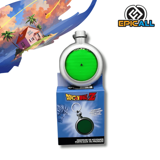 Llavero circular que representa el Radar de las Esferas del Dragón de la serie Dragon Ball. El dispositivo es de color plateado con una pantalla central circular de color verde brillante que muestra una cuadrícula y un pequeño triángulo negro indicativo. Debajo del radar se observa su caja de empaque azul con el logotipo de Dragon Ball Z, indicando que posee funciones de luz y sonido.