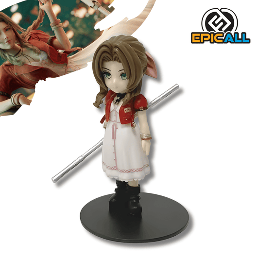 Una pequeña figura de estatua de Aeris del videojuego Final Fantasy VII, en un estilo chibi (cabeza grande y cuerpo pequeño). El personaje tiene cafe largo, y tiene su caracteristico vestido blanco con chaqueta roja, en la mano tiene la vara.