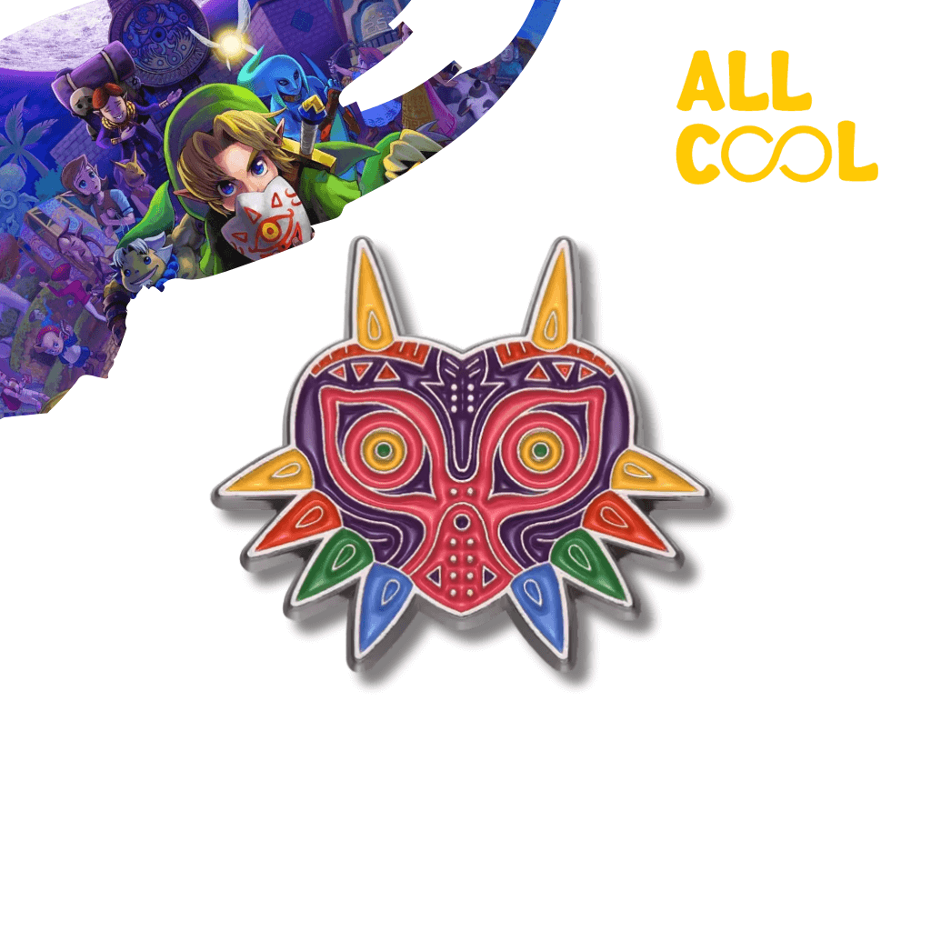 Pin metálico con el diseño de la máscara de Majora's Mask del videojuego The Legend of Zelda: Majora's Mask. El pin es multicolor y tiene un acabado brillante.